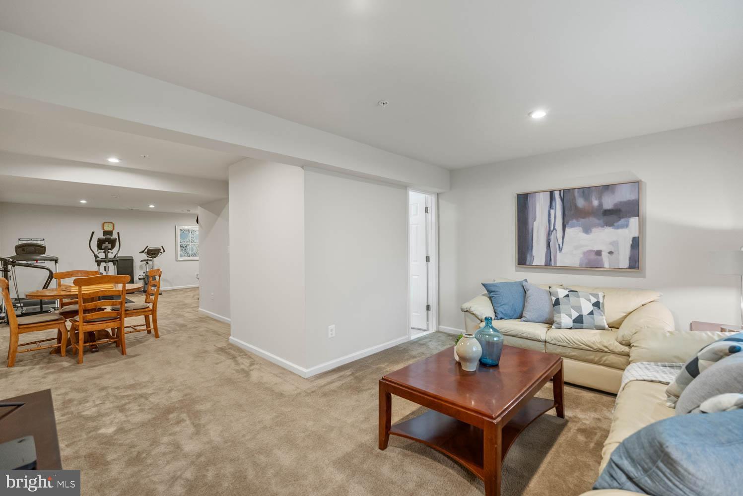 17883 Sugarberry Road Dumfries, VA 22026 - Photo 47 of 53 a living room with furniture