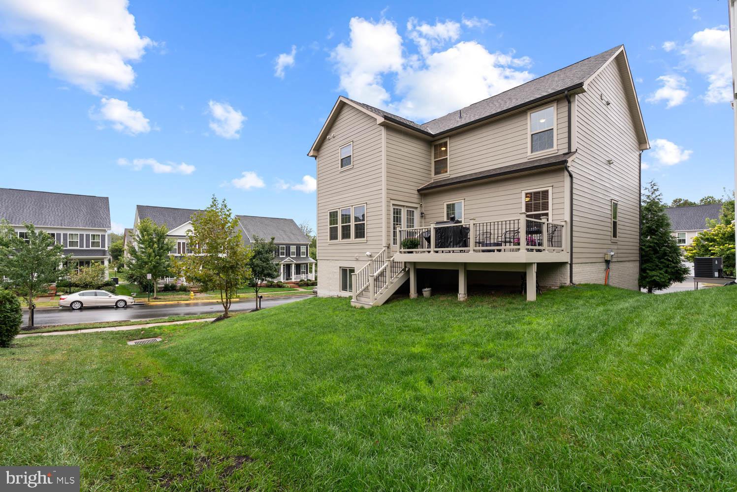 17883 Sugarberry Road Dumfries, VA 22026 - Photo 53 of 53 a house view with a garden space
