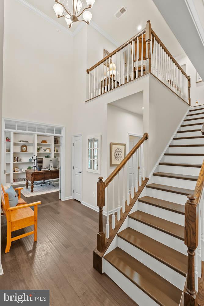 17883 Sugarberry Road Dumfries, VA 22026 - Photo 6 of 53 a view of entryway livingroom and hall with wooden floor