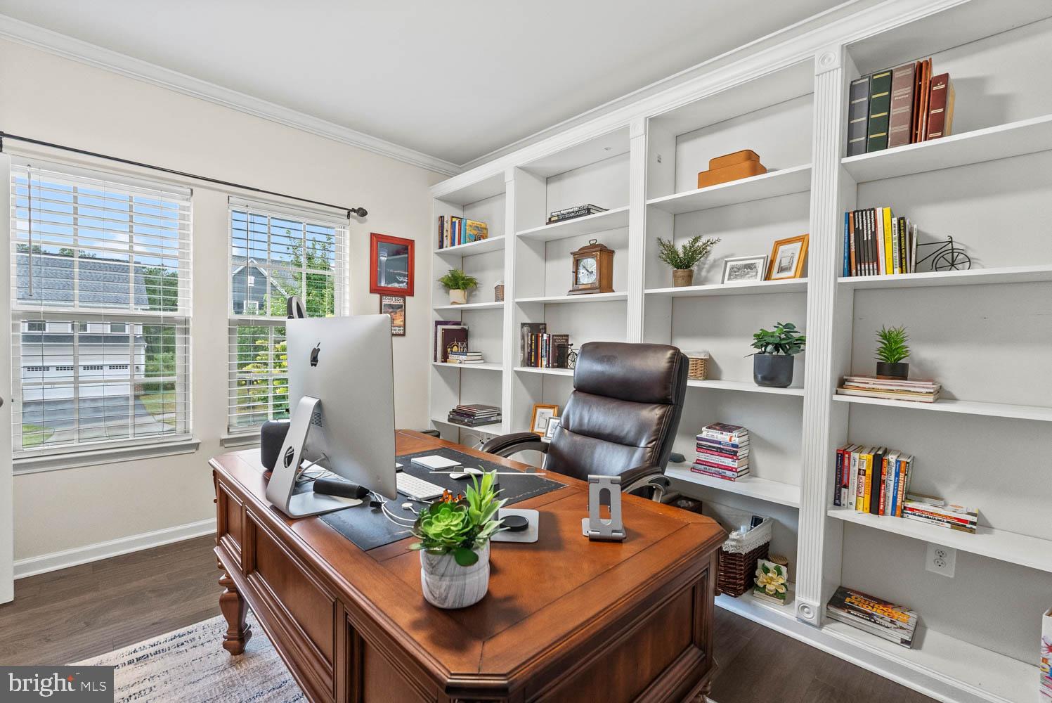 17883 Sugarberry Road Dumfries, VA 22026 - Photo 7 of 53 a living room with furniture and a book shelf