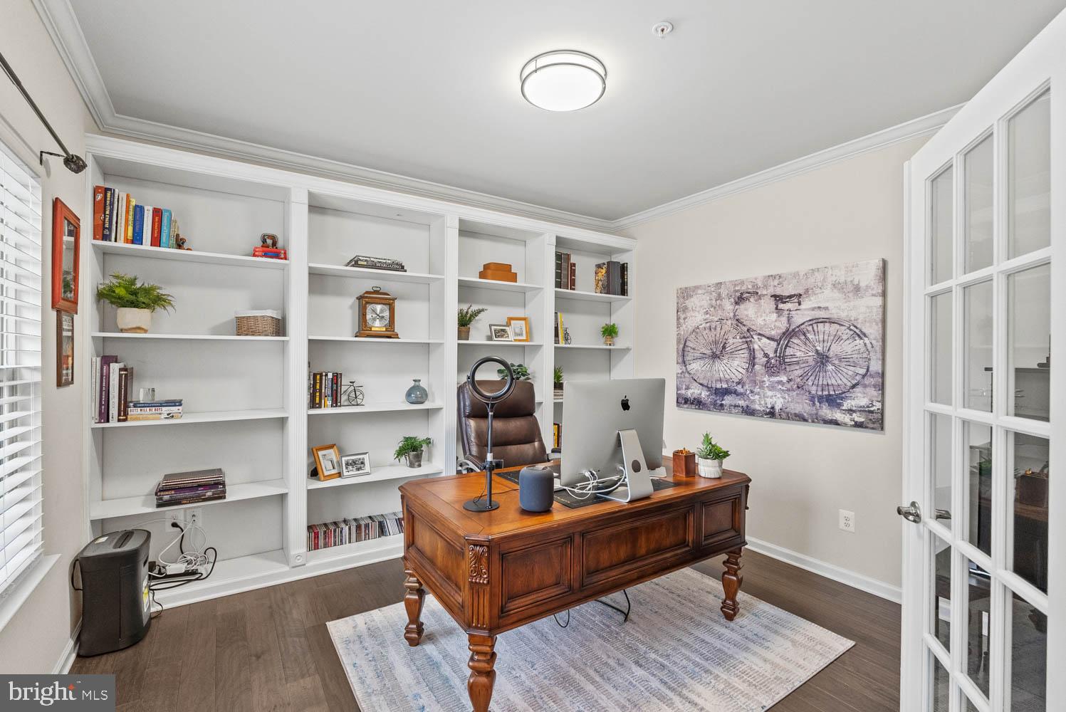 17883 Sugarberry Road Dumfries, VA 22026 - Photo 8 of 53 a living room with furniture and a bookshelf