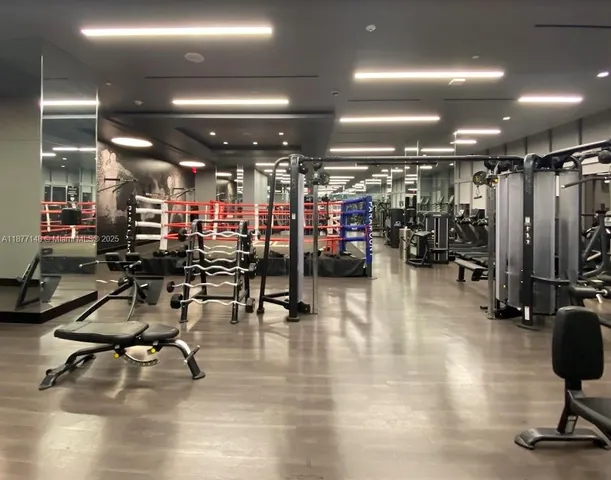 a view of a room with gym equipment