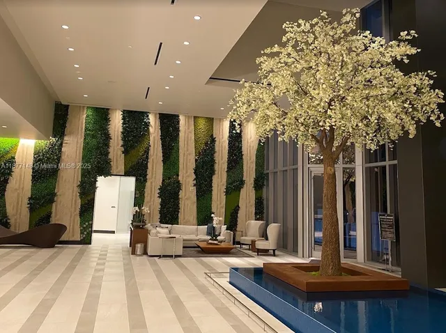 a view of swimming pool with chairs