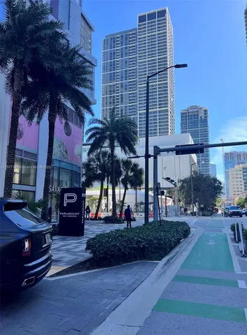a front view of a building with glass windows