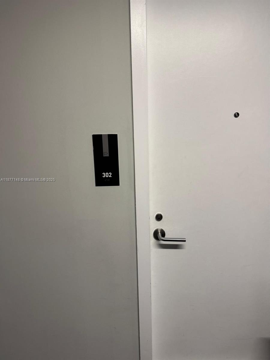 851 Northeast 1st Avenue, Unit 302 Miami, FL 33132 - Photo 22 of 30 a bathroom with a shower