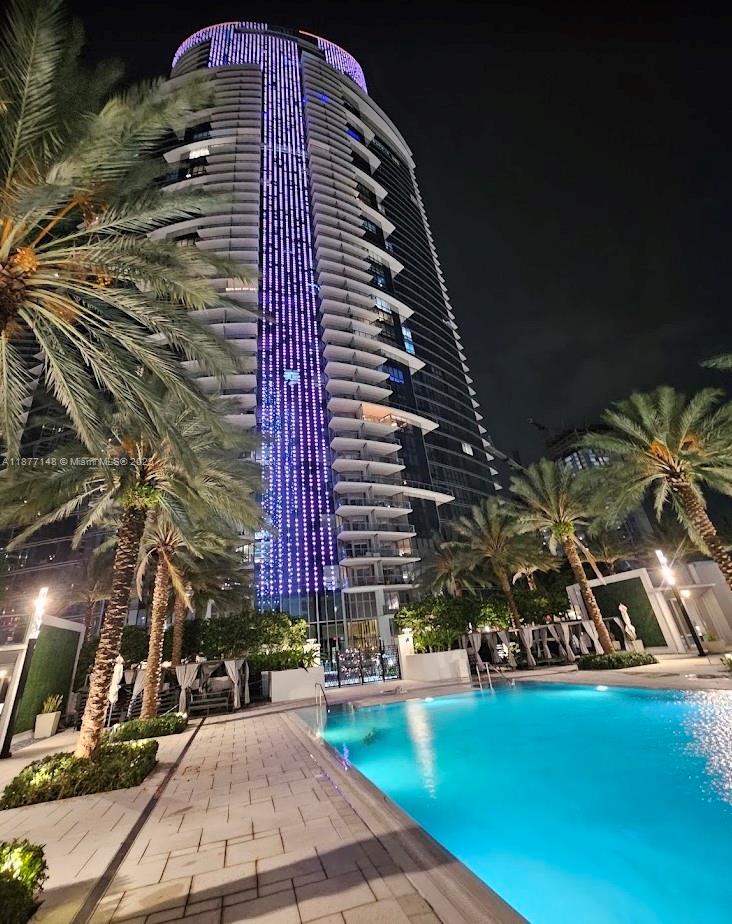 851 Northeast 1st Avenue, Unit 302 Miami, FL 33132 - Photo 3 of 30 a view of a tall building with a yard