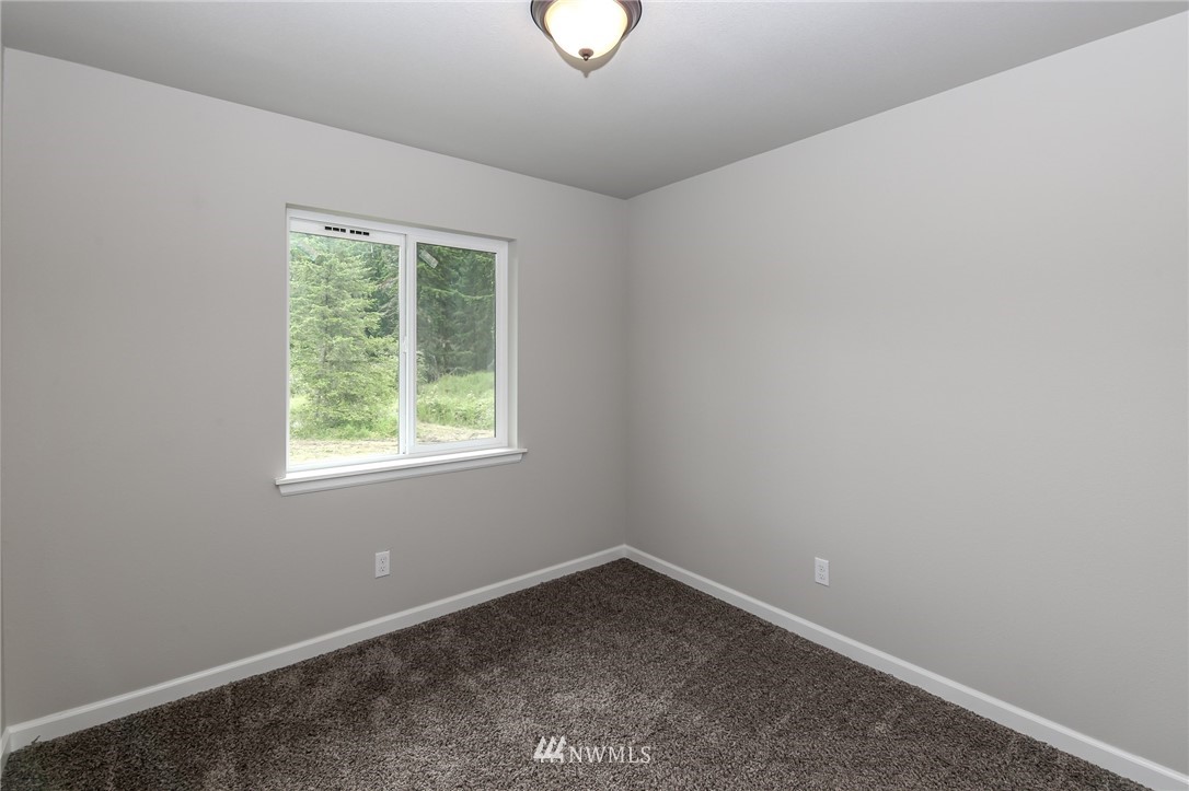 36313 Allen Road South Roy, WA 98580 - Photo 13 of 20 an empty room with a window