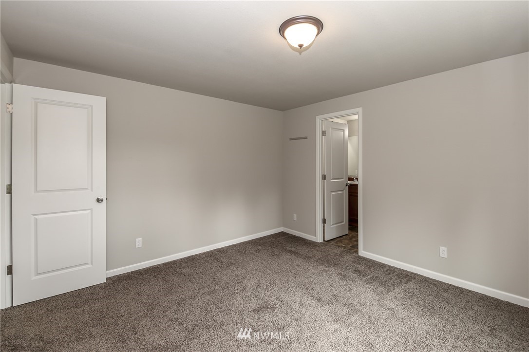 36313 Allen Road South Roy, WA 98580 - Photo 15 of 20 an empty room with an entryway door