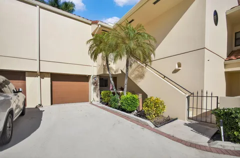 a view of a lake with houses in the back