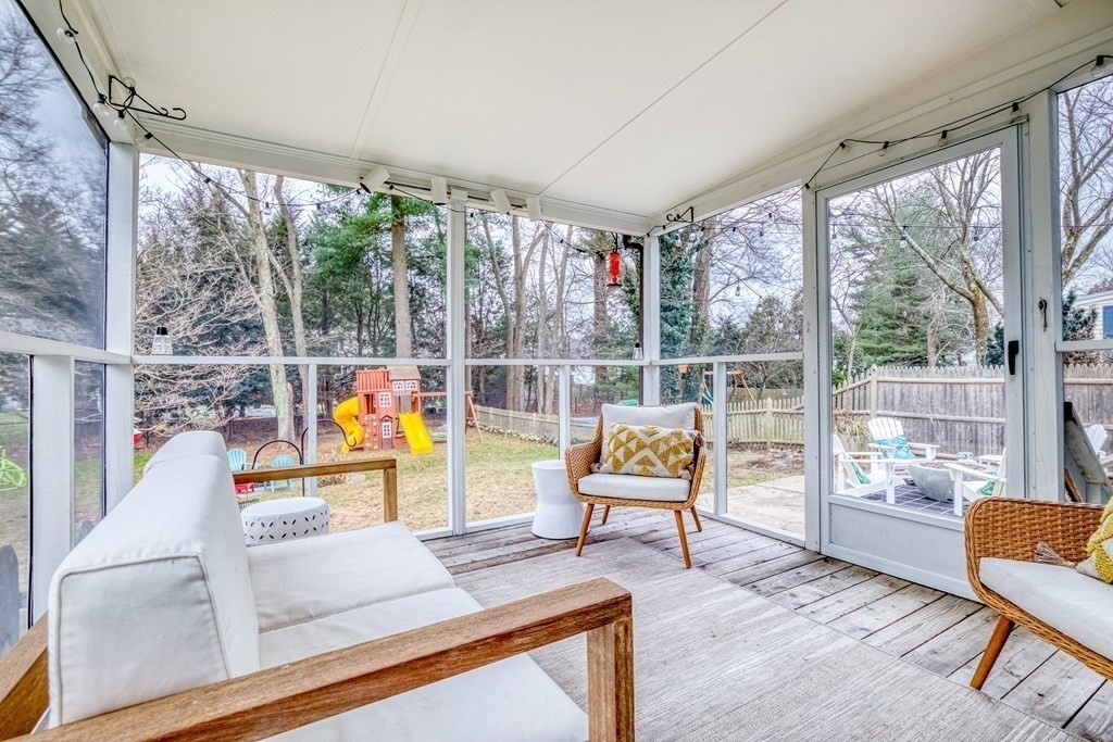 49 Jean Street Framingham, MA 01701 - Photo 12 of 41 a view of a floor to ceiling window and wooden floor