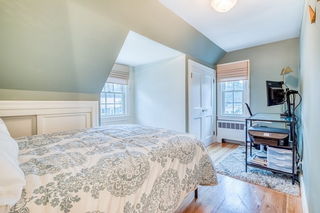 49 Jean Street Framingham, MA 01701 - Photo 20 of 41 a bed room with a bed and a chair