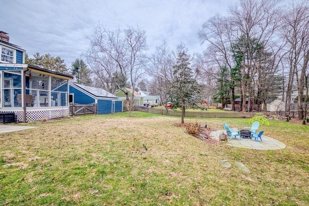 49 Jean Street Framingham, MA 01701 - Photo 25 of 41 a view of a house with swimming pool and yard