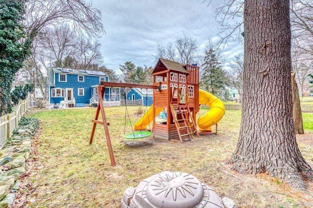 49 Jean Street Framingham, MA 01701 - Photo 28 of 41 a view of a house with a backyard and swimming pool
