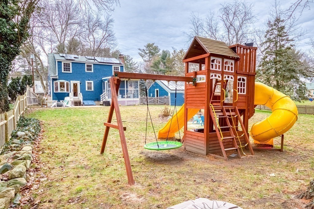 49 Jean Street Framingham, MA 01701 - Photo 29 of 41 a view of a house with backyard and a slide