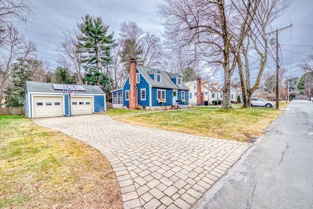49 Jean Street Framingham, MA 01701 - Photo 3 of 41 a house with swimming pool in front of it