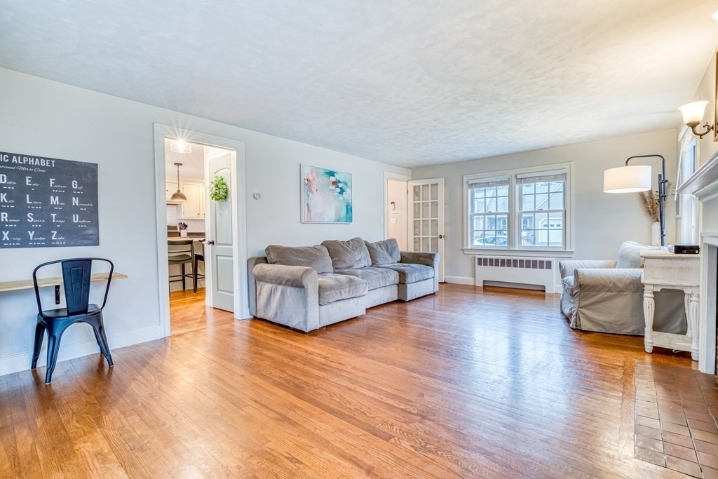 49 Jean Street Framingham, MA 01701 - Photo 10 of 41 a living room with furniture and a wooden floor