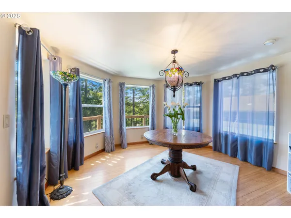 a kitchen with stainless steel appliances granite countertop a stove and a refrigerator