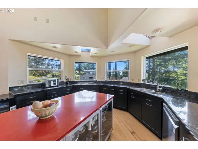 a kitchen with a sink and wooden cabinets