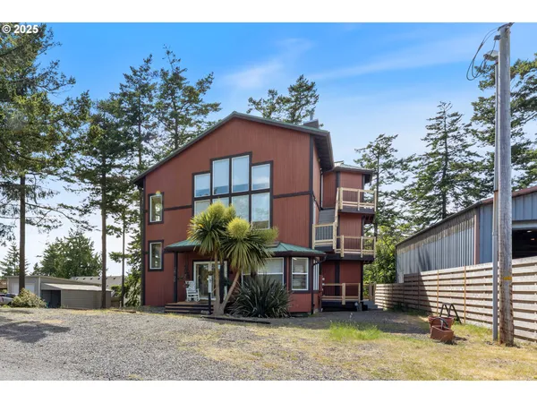 a view of a room with large windows