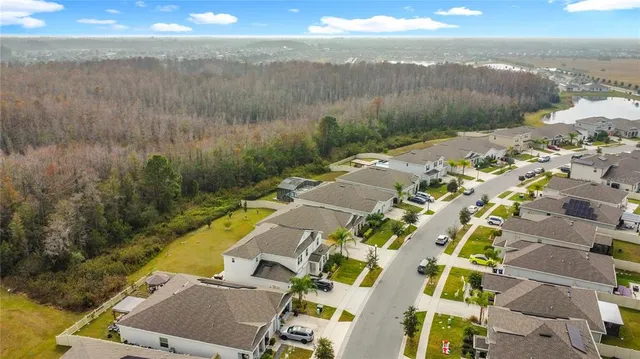 a view of a lake with a yard