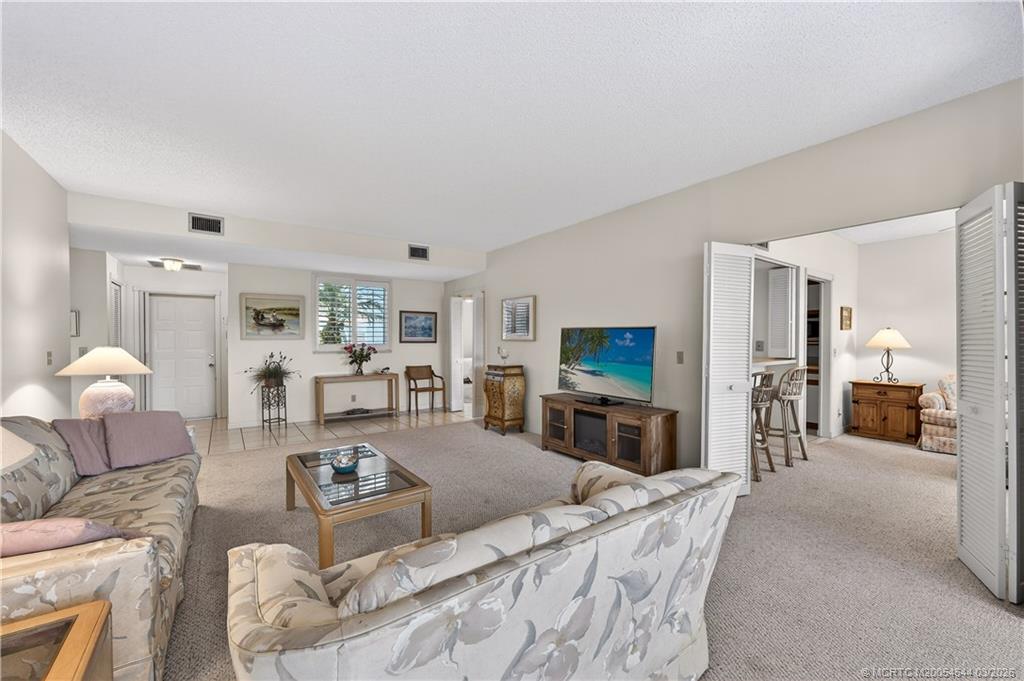12455 Harbour Ridge Boulevard, Unit 25 Palm City, FL 34990 - Photo 1 of 37
