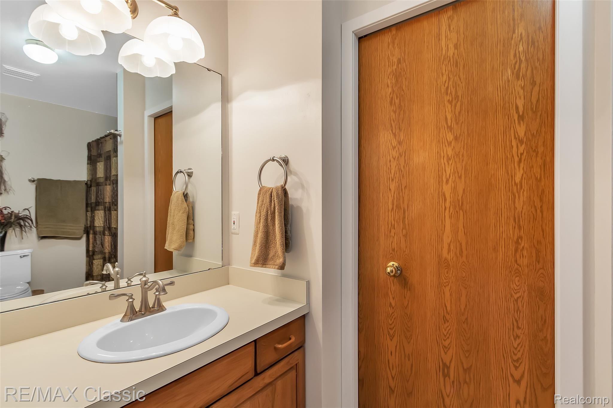 3344 Rivers Edge Drive Wayne, MI 48184 - Photo 24 of 50 Master Bathroom vanity and linen closet. view 1 of 2