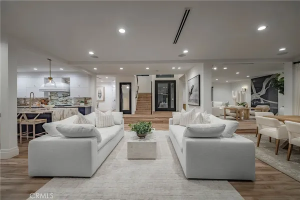 a view of a chairs and table in a patio