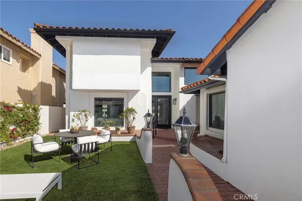 a view of a living room and dining room