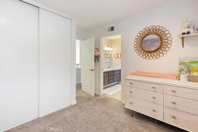 a view of a storage and utility room with closet