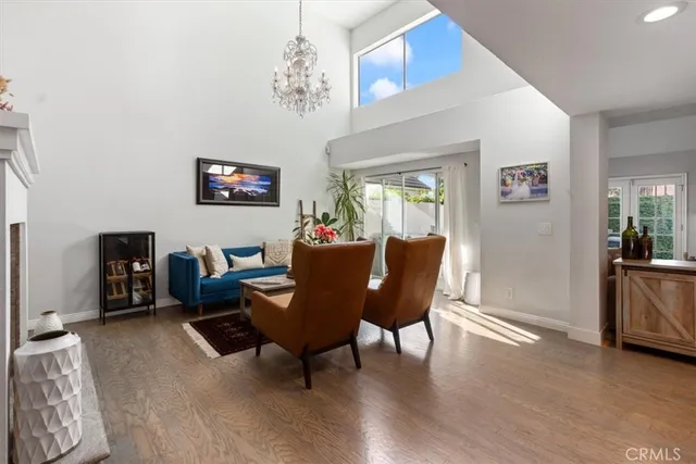 a view of a livingroom with furniture and a workspace