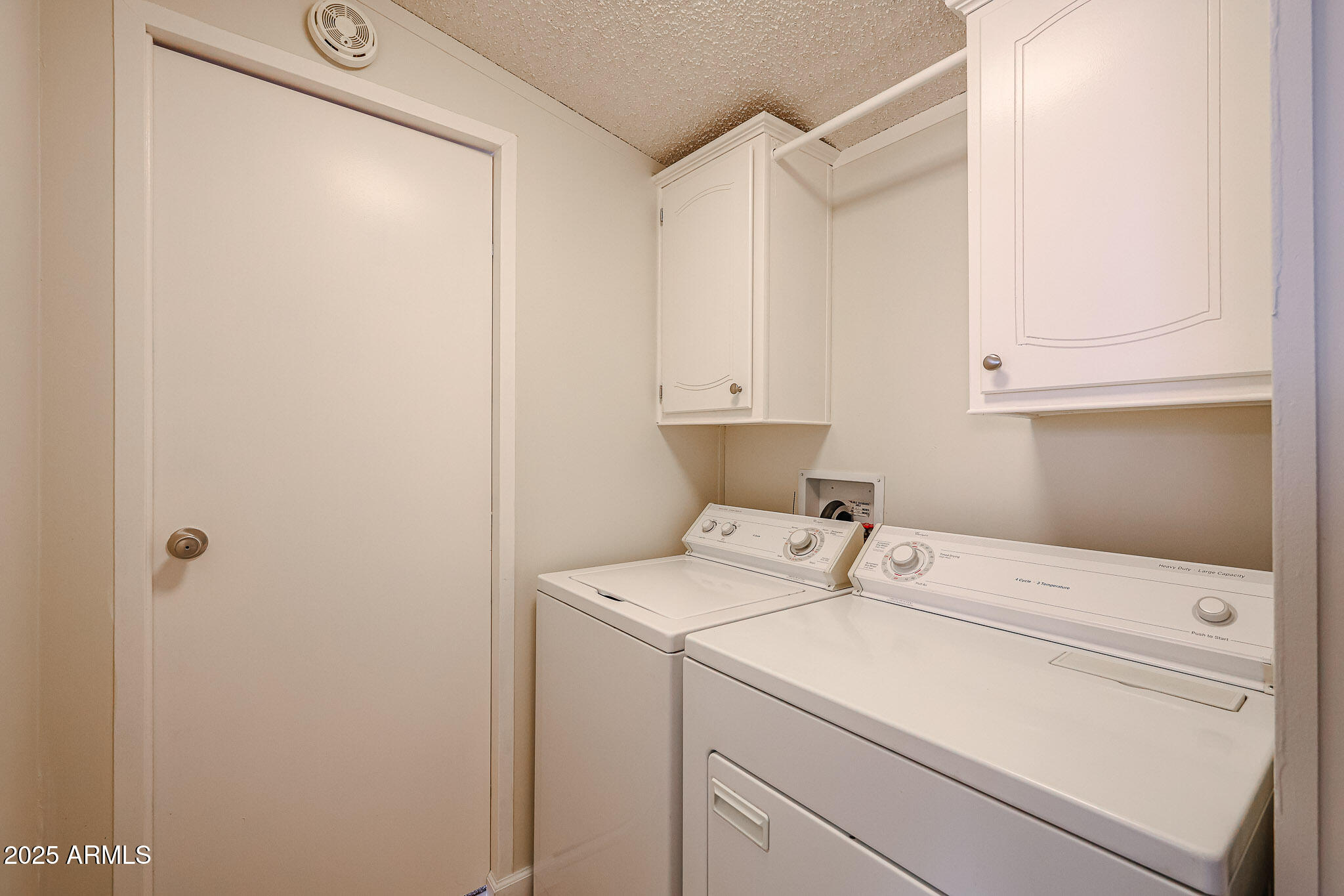 3901 East Pinnacle Peak Road, Unit 36 Phoenix, AZ 85050 - Photo 13 of 26 a utility room with dryer and washer