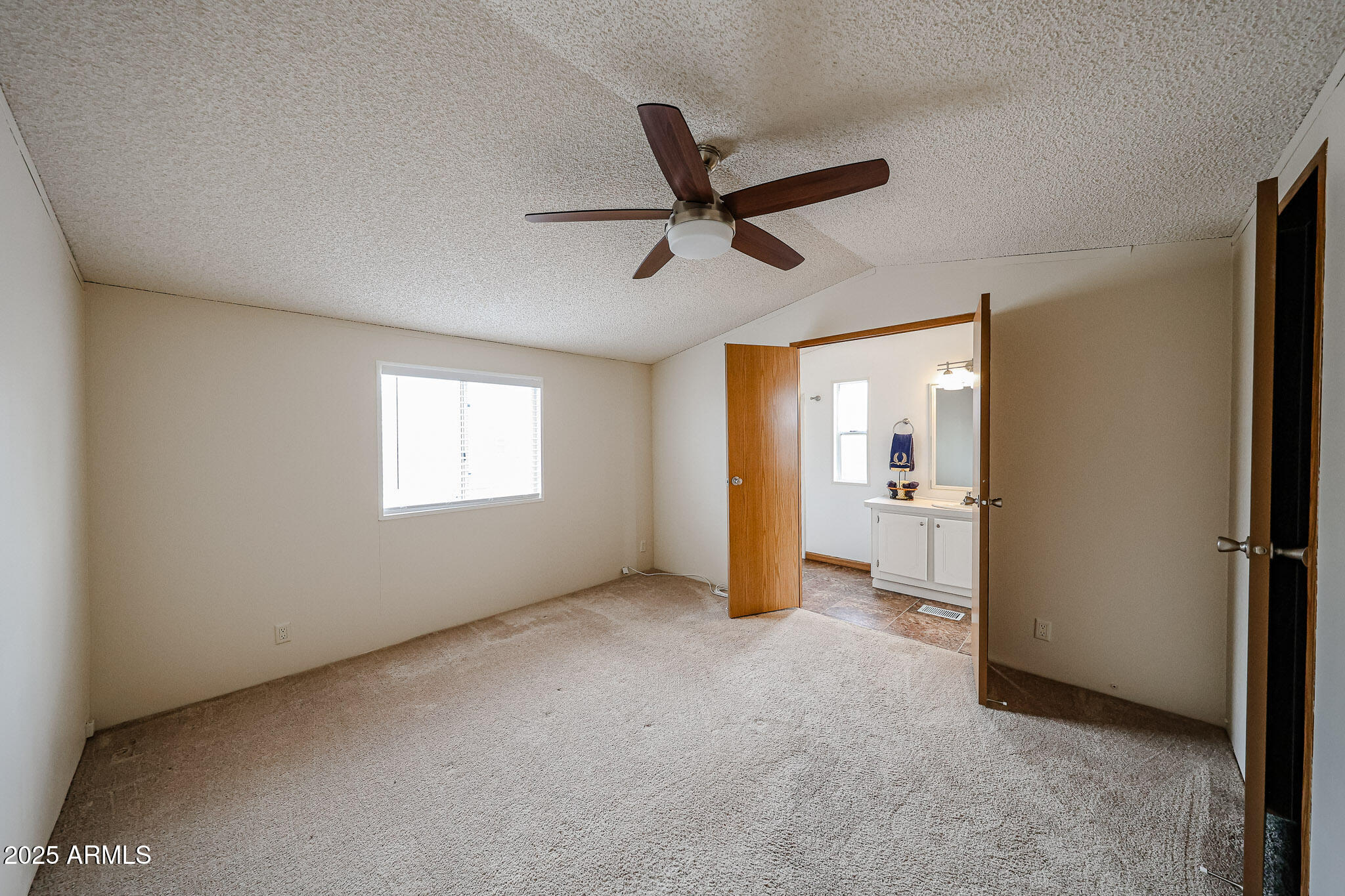 3901 East Pinnacle Peak Road, Unit 36 Phoenix, AZ 85050 - Photo 15 of 26 a view of empty room with window