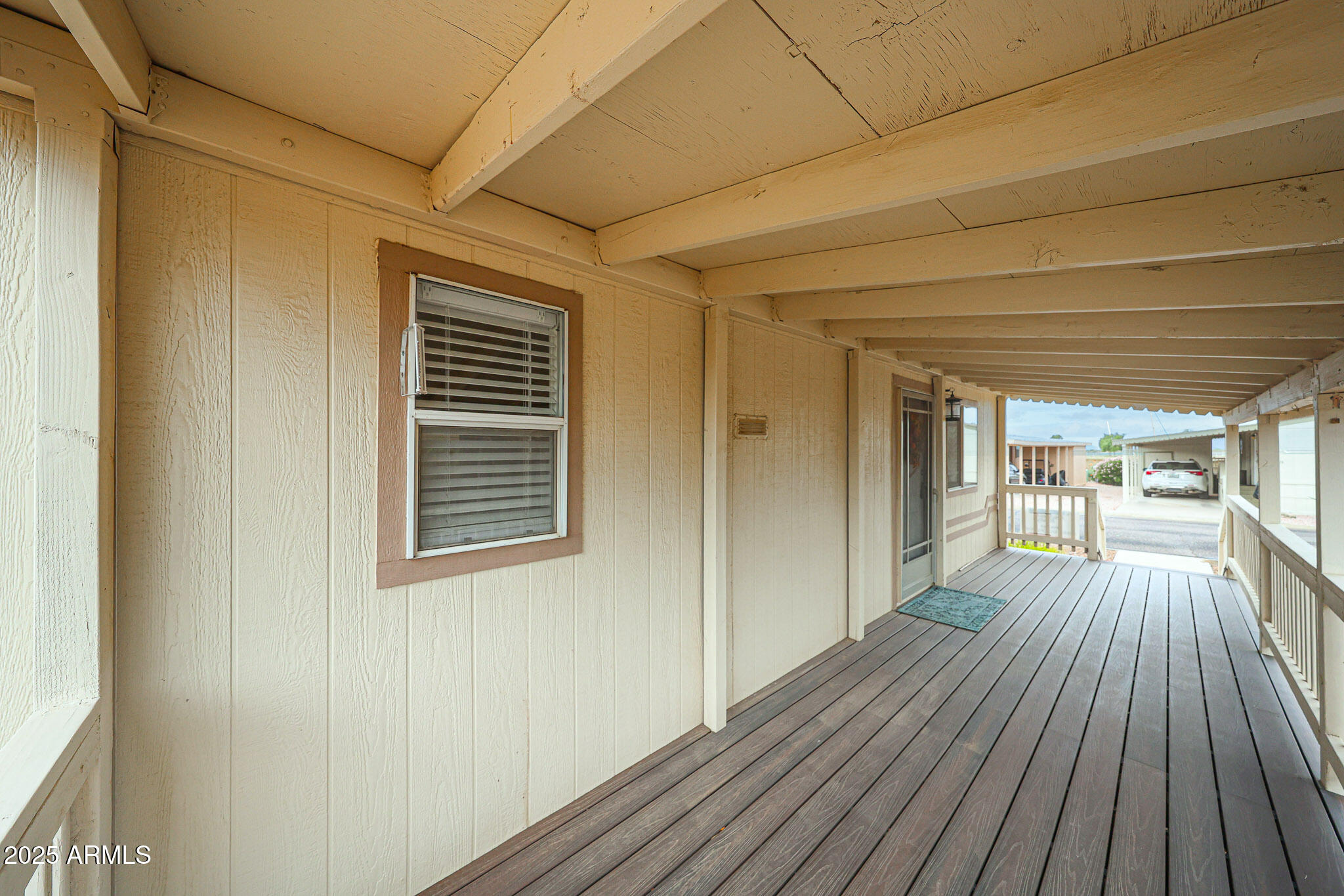 3901 East Pinnacle Peak Road, Unit 36 Phoenix, AZ 85050 - Photo 23 of 26 a view of a house with wooden floor