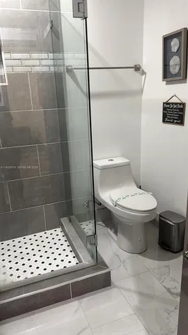 a bathroom with a toilet