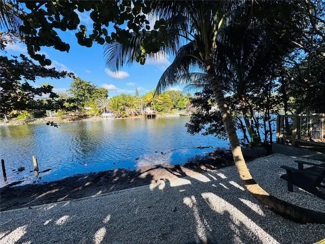 a view of a lake with houses