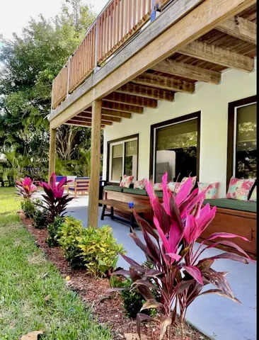 a view of yard with an outdoor seating