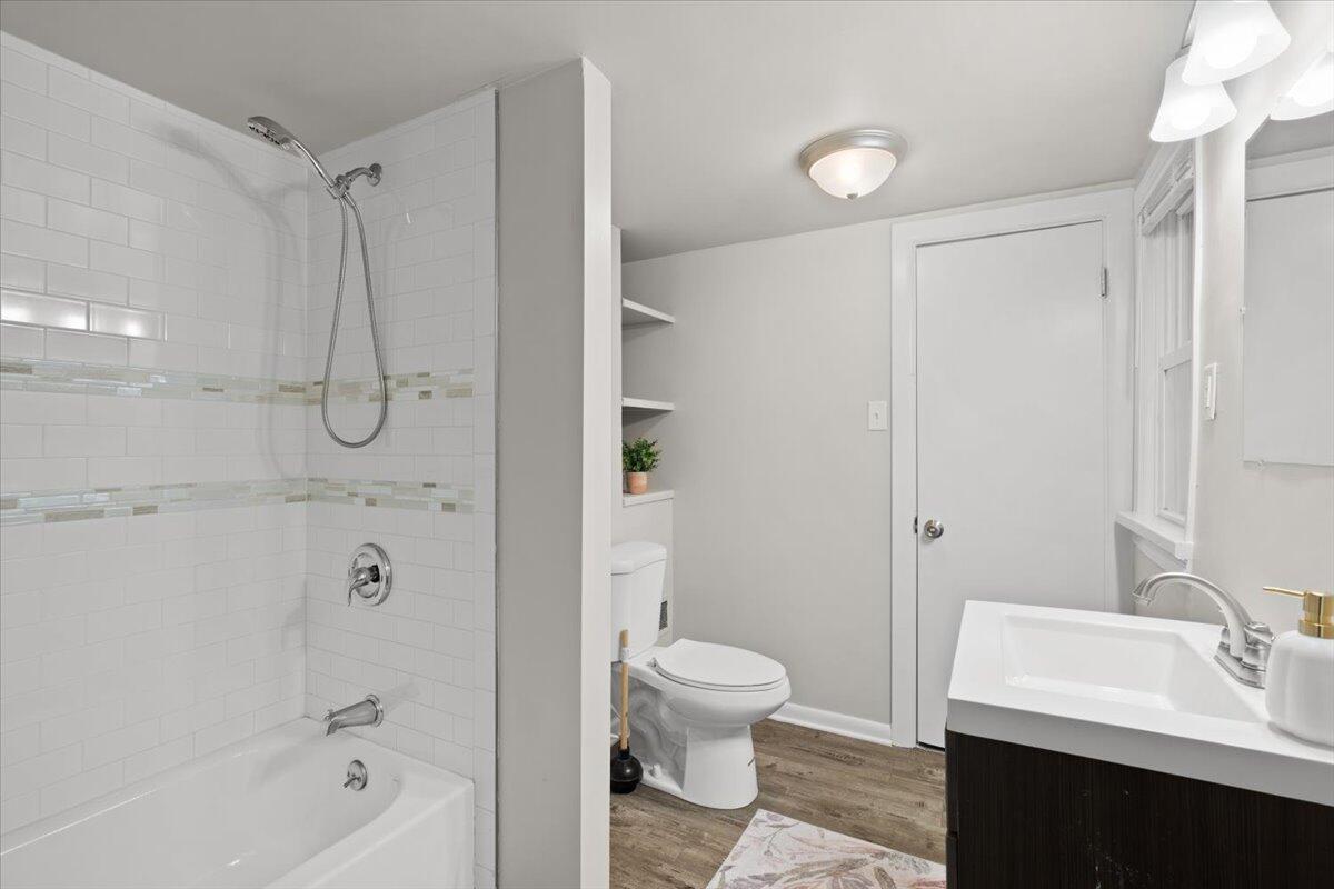 3642 Buchanan Street Gary, IN 46408 - Photo 20 of 25 a bathroom with a sink toilet and shower