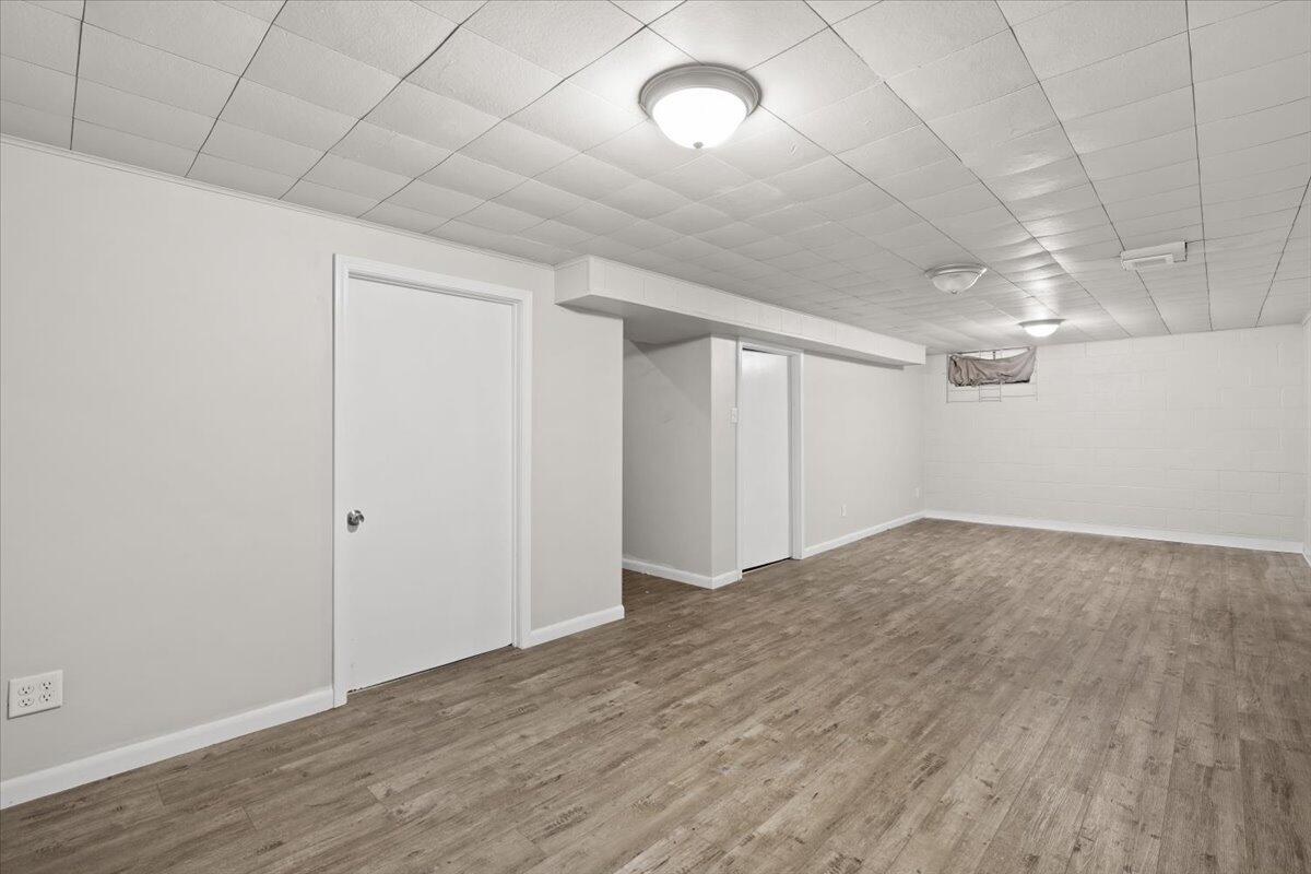 3642 Buchanan Street Gary, IN 46408 - Photo 21 of 25 a view of empty room with wooden floor