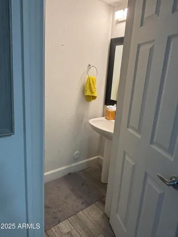 a large kitchen with a stove a sink dishwasher and a refrigerator