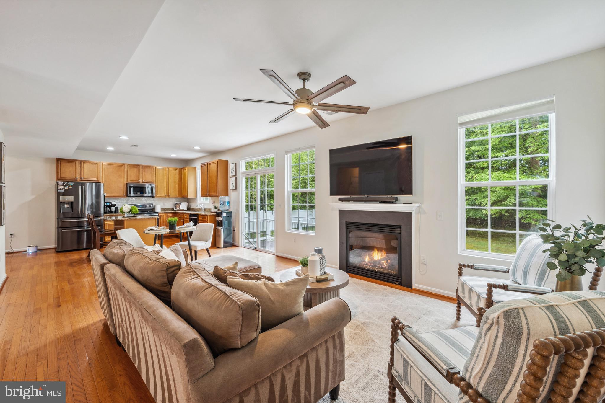 1407 James Way Edgewater, MD 21037 - Photo 16 of 30 a living room with furniture fireplace and a flat screen tv