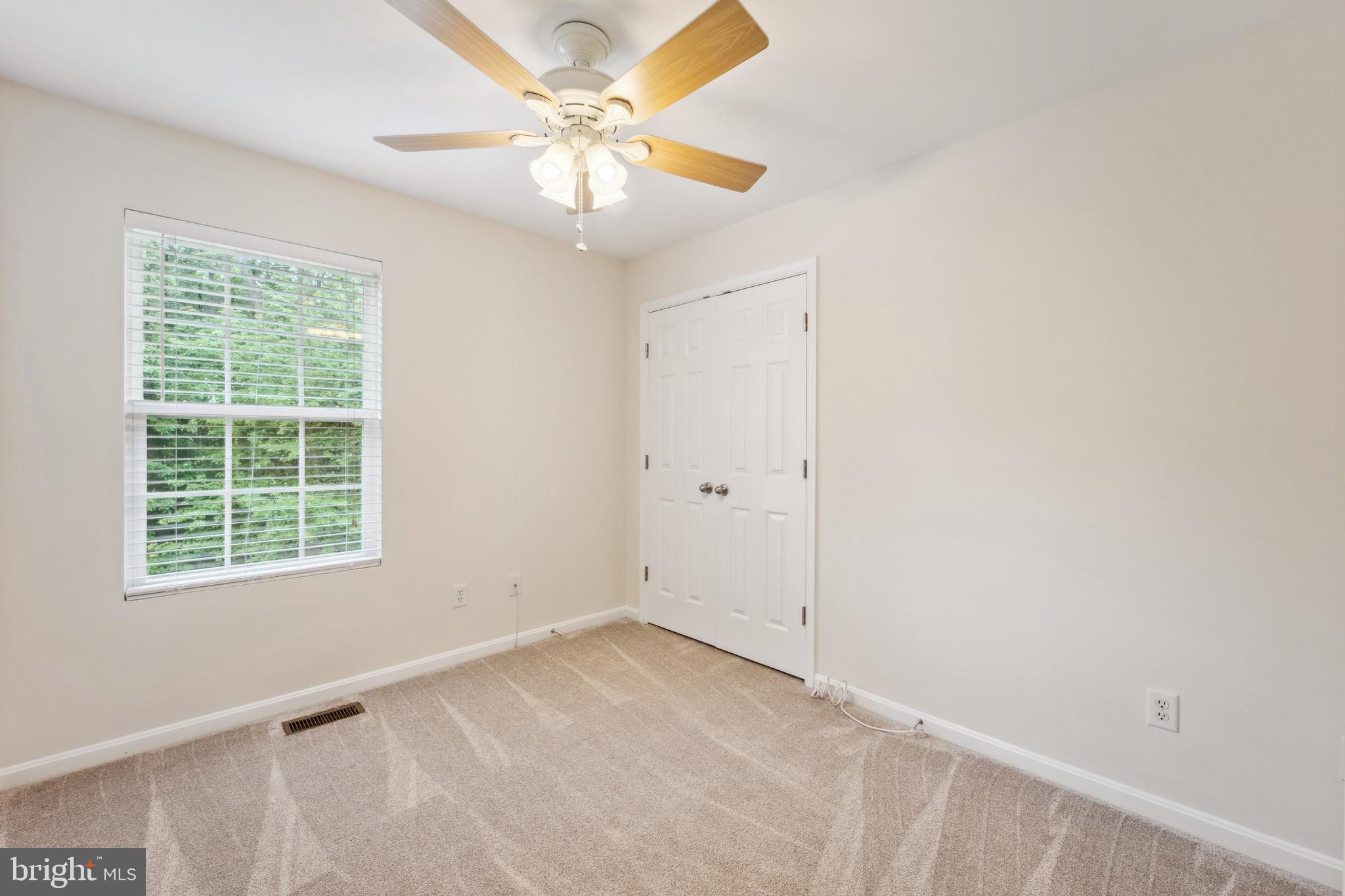 1407 James Way Edgewater, MD 21037 - Photo 22 of 30 an empty room with a window
