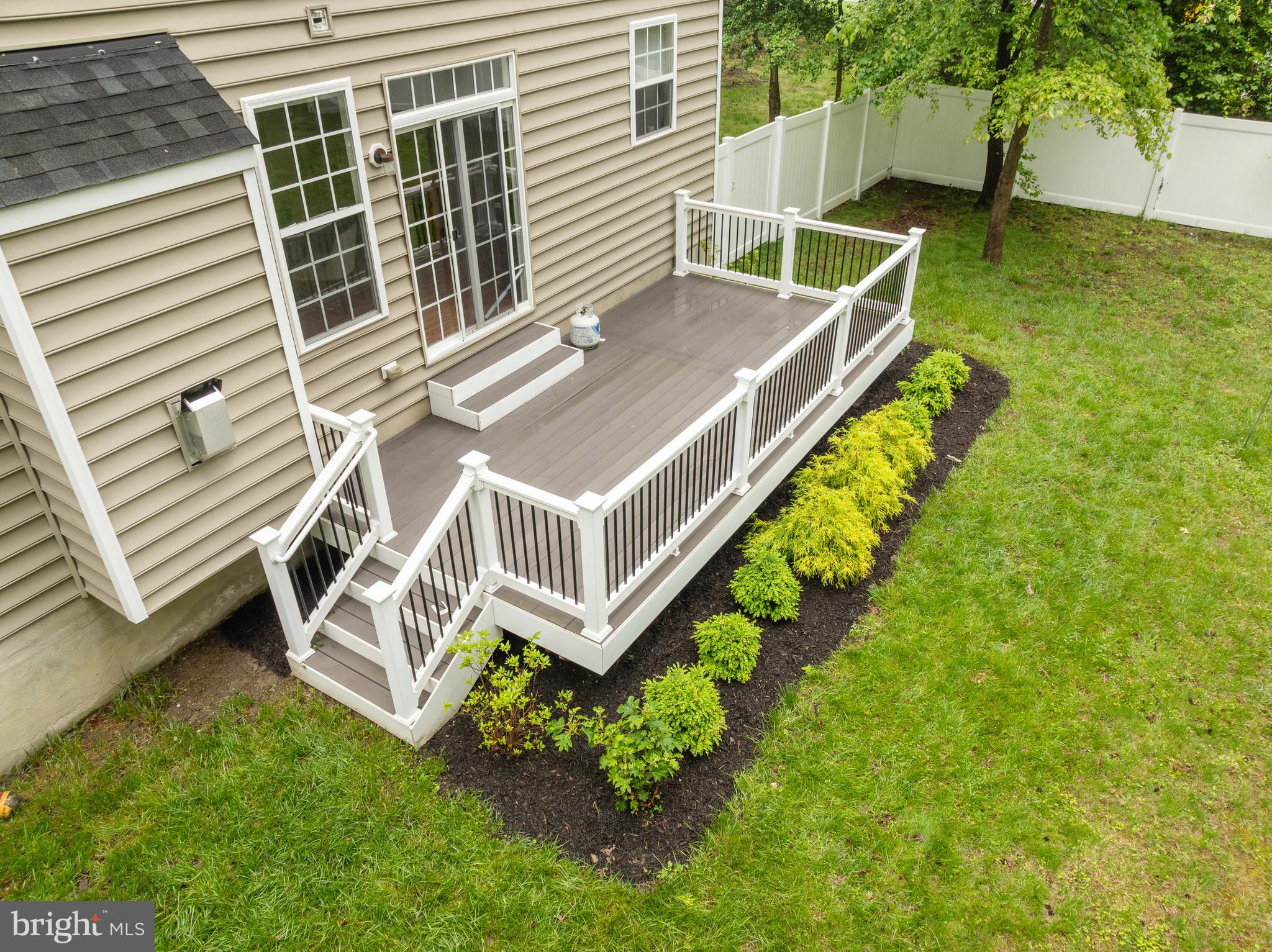 1407 James Way Edgewater, MD 21037 - Photo 27 of 30 a view of a house with backyard and deck