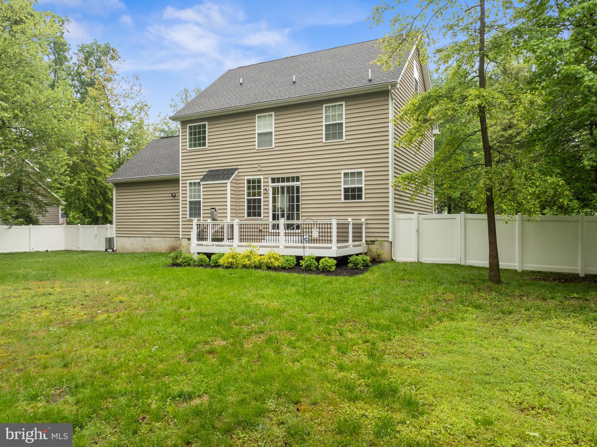 1407 James Way Edgewater, MD 21037 - Photo 28 of 30 a view of a house with a backyard