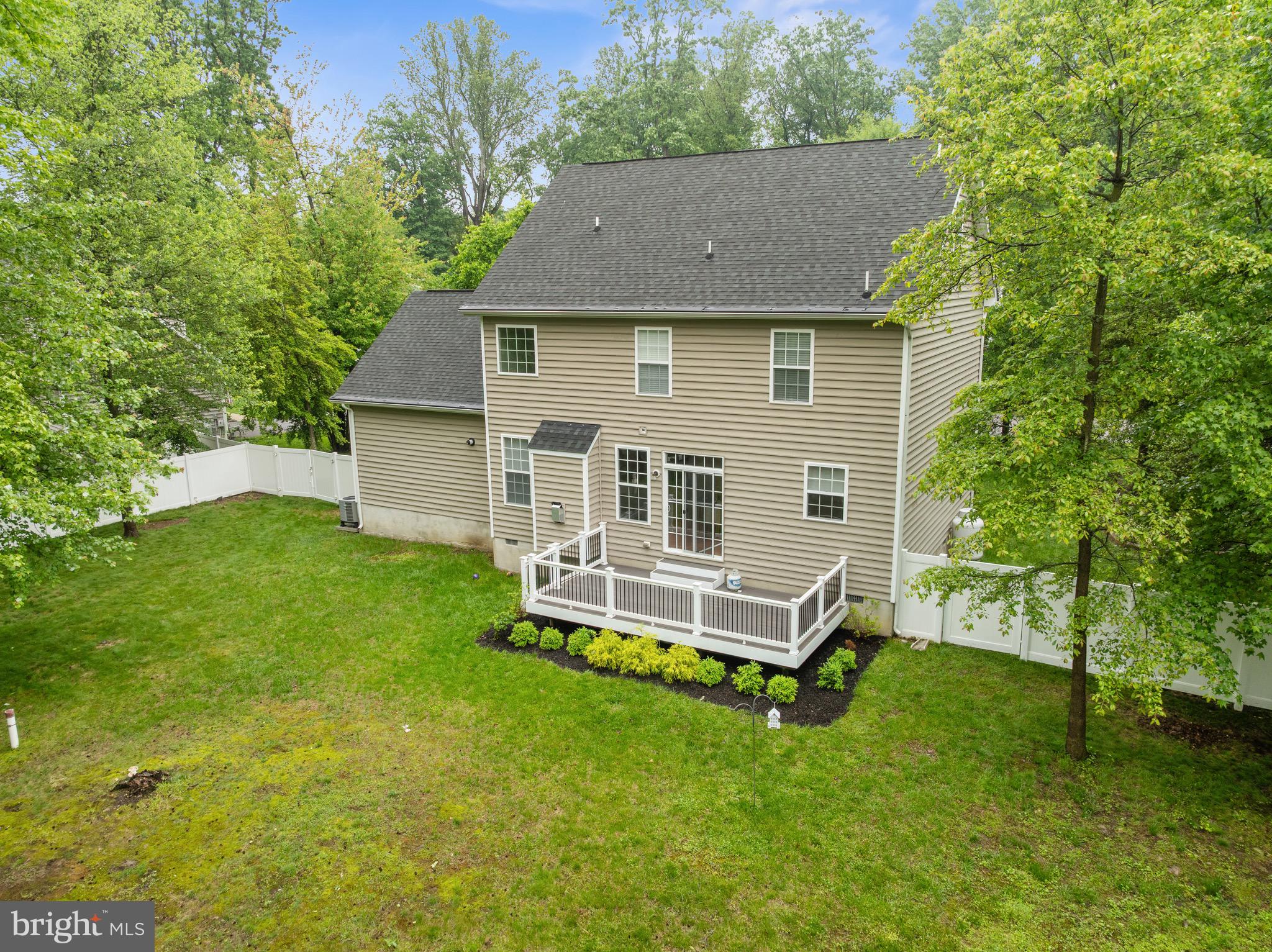 1407 James Way Edgewater, MD 21037 - Photo 29 of 30 a aerial view of a house with a yard table and chairs