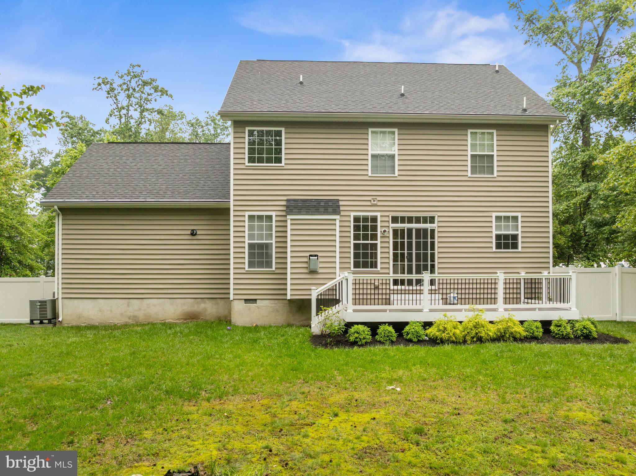 1407 James Way Edgewater, MD 21037 - Photo 30 of 30 a front view of a house with a yard