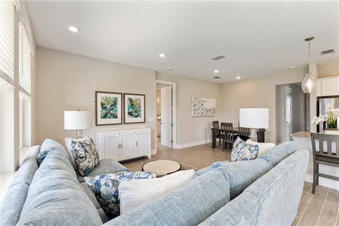 a living room with furniture and a couch