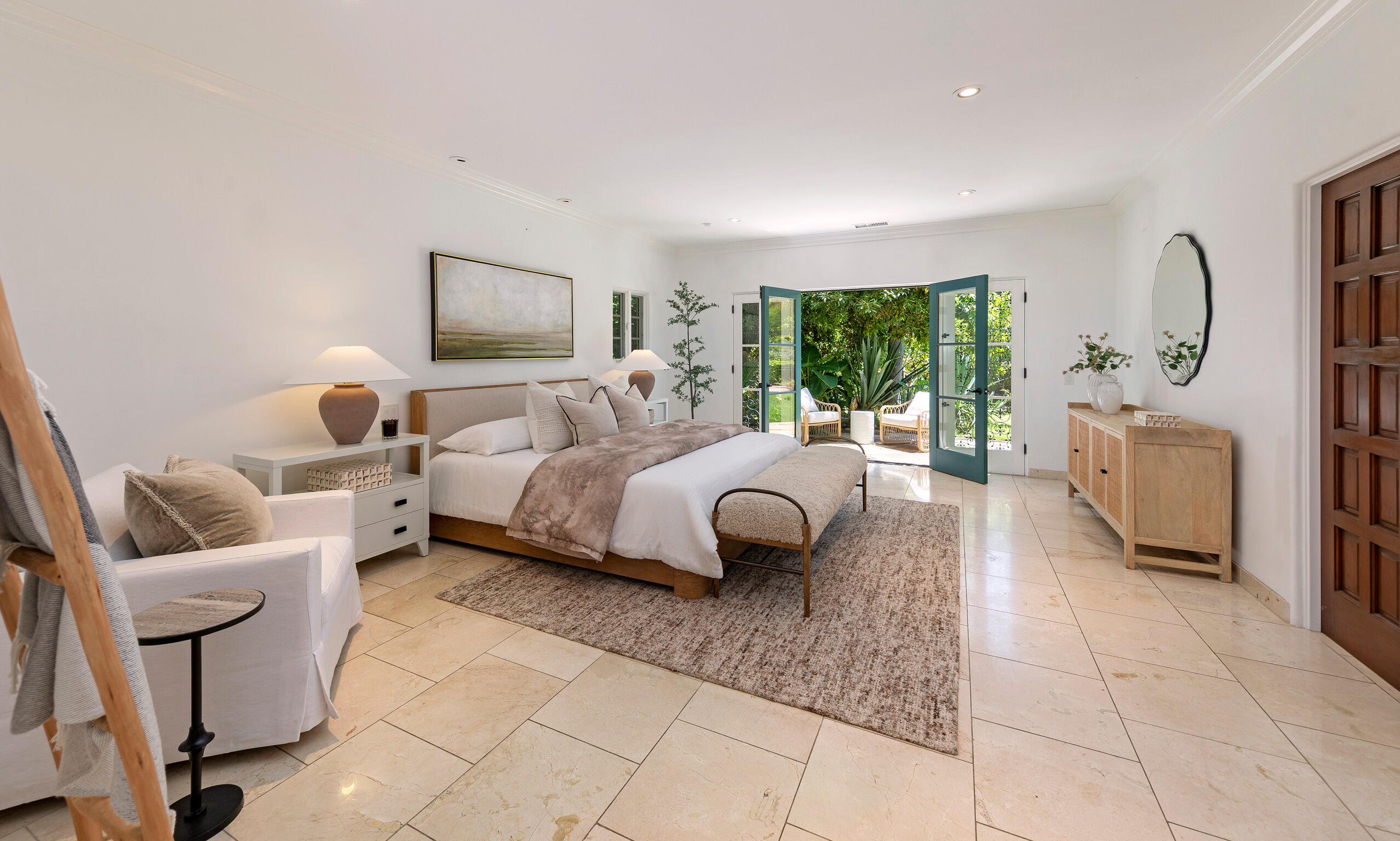1493 Sycamore Canyon Road Montecito, CA 93108 - Photo 16 of 47 a bedroom with a bed a couch and a window