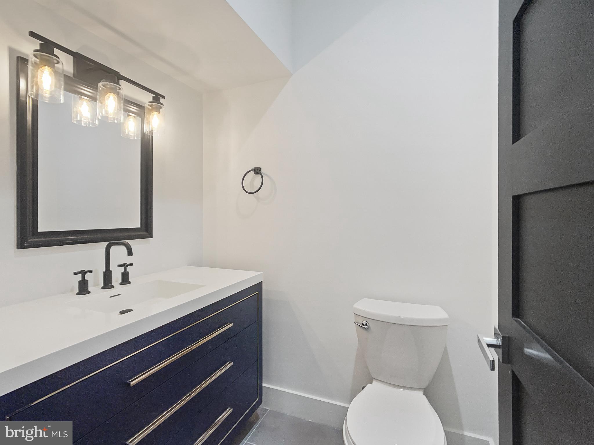 2228 13th Street Northwest, Unit 3 Washington, DC 20009 - Photo 13 of 44 Sleek modern bathroom with elegant fixtures.