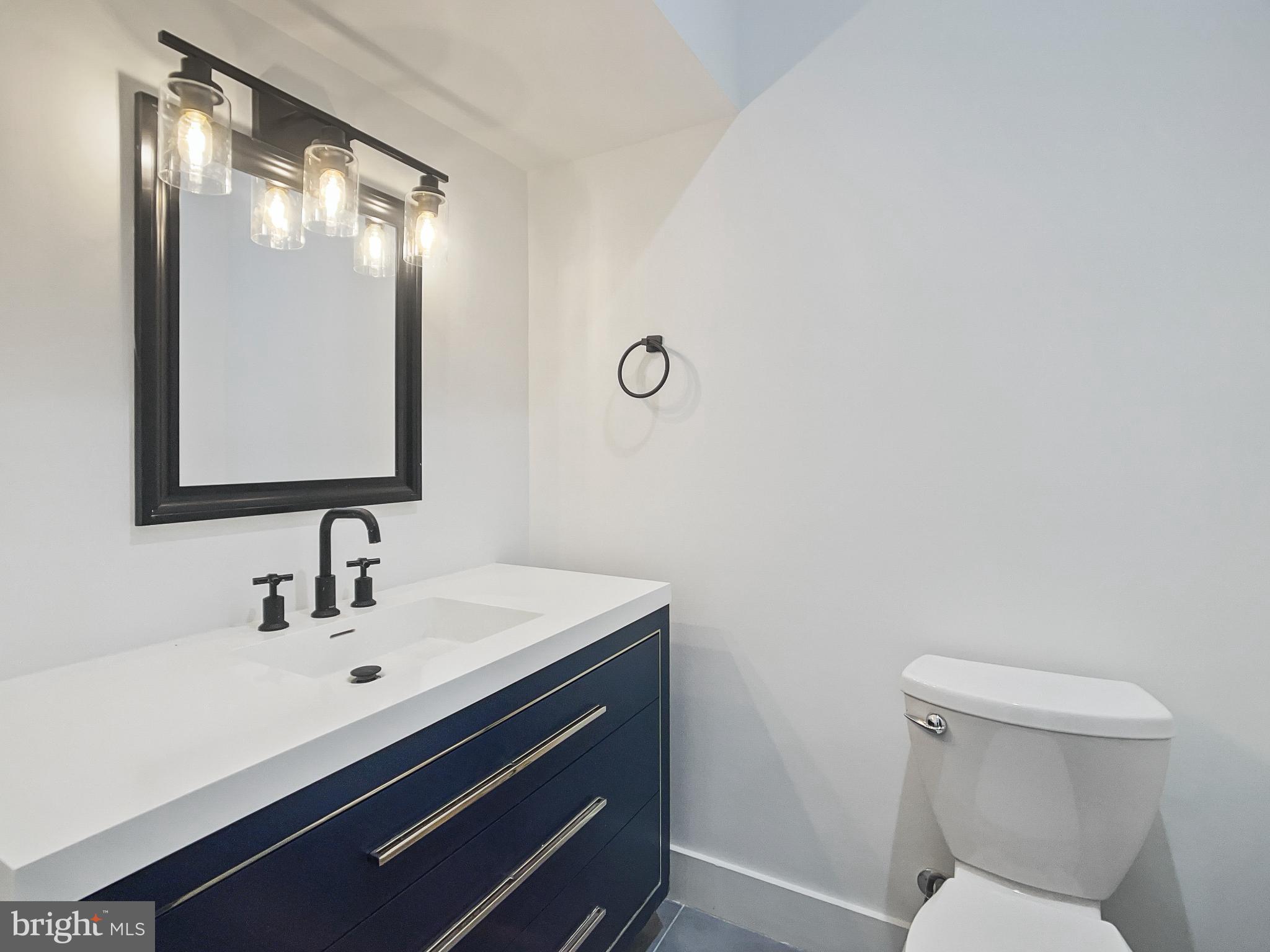 2228 13th Street Northwest, Unit 3 Washington, DC 20009 - Photo 14 of 44 Sleek modern bathroom with stylish fixtures.