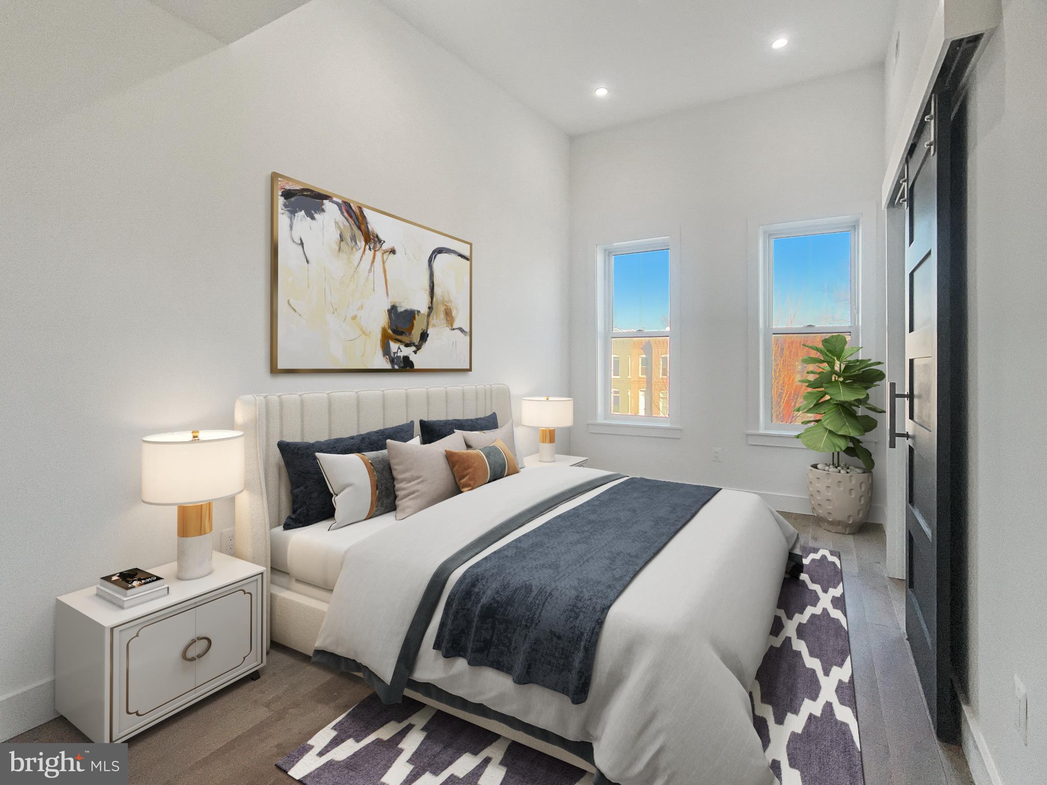 2228 13th Street Northwest, Unit 3 Washington, DC 20009 - Photo 15 of 44 Modern bedroom with bright, airy ambiance.